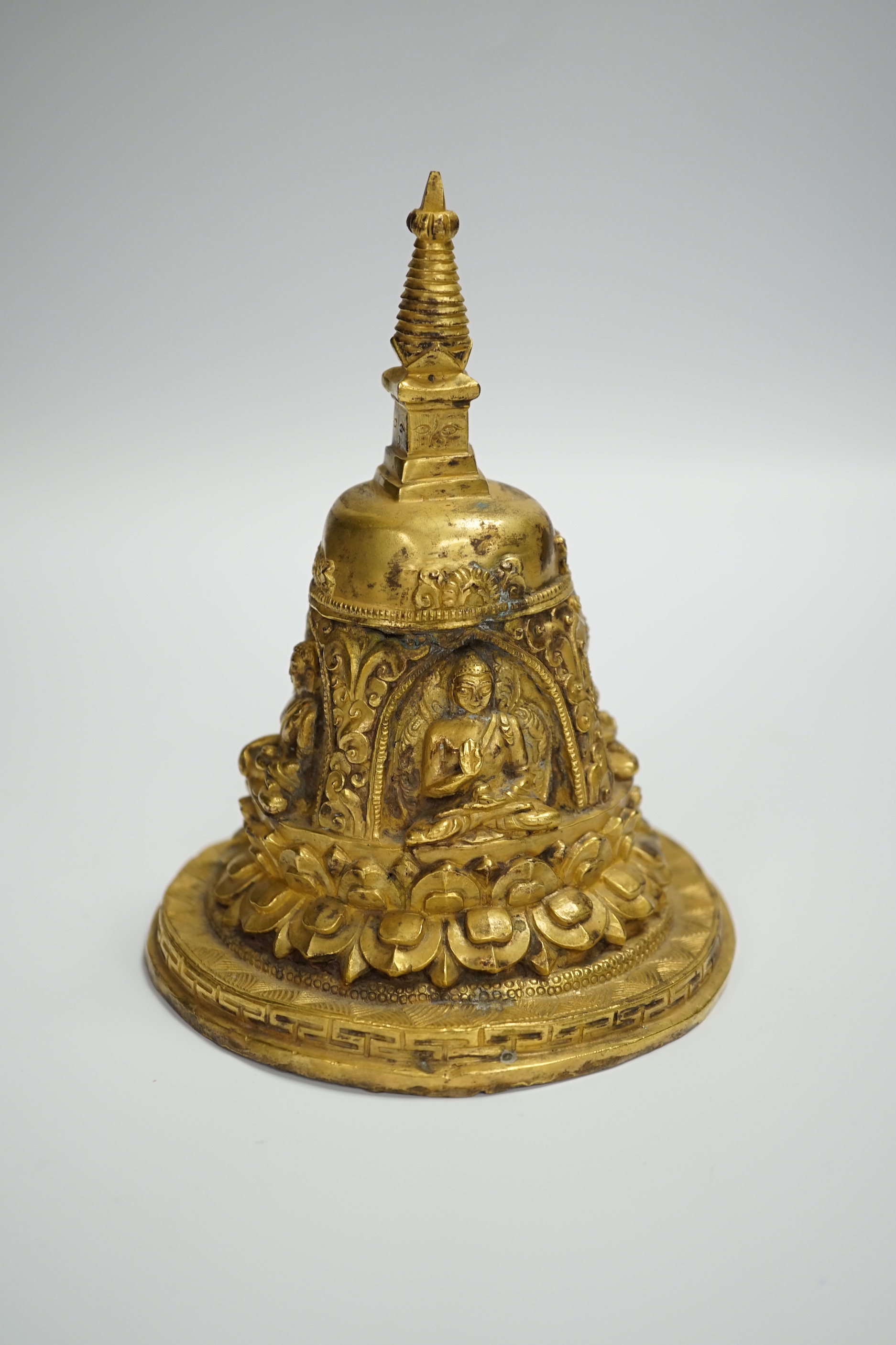 A Sino-Tibetan gilt bronze model of a stupa, 16cm high